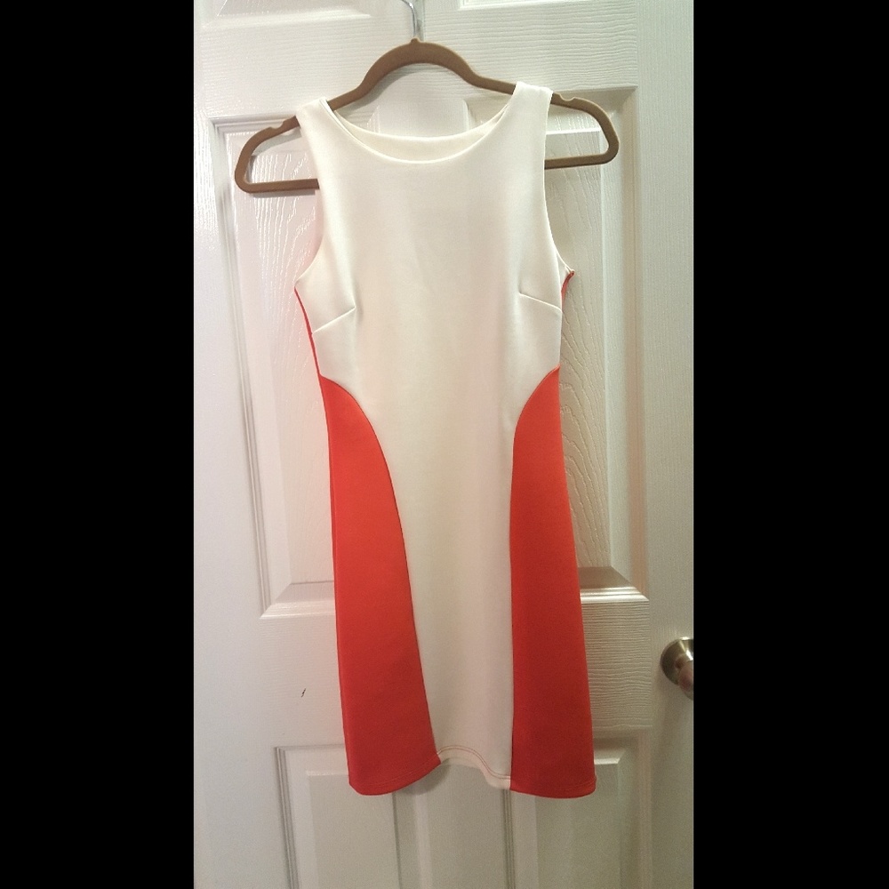 White and coral/salmon sleeveless dress.